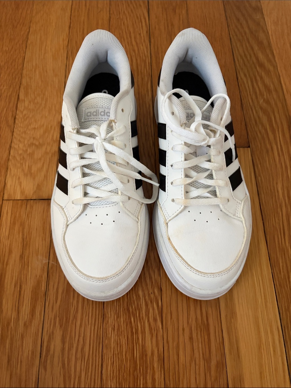 adidas women’s White and Black Low-Top Sneakers